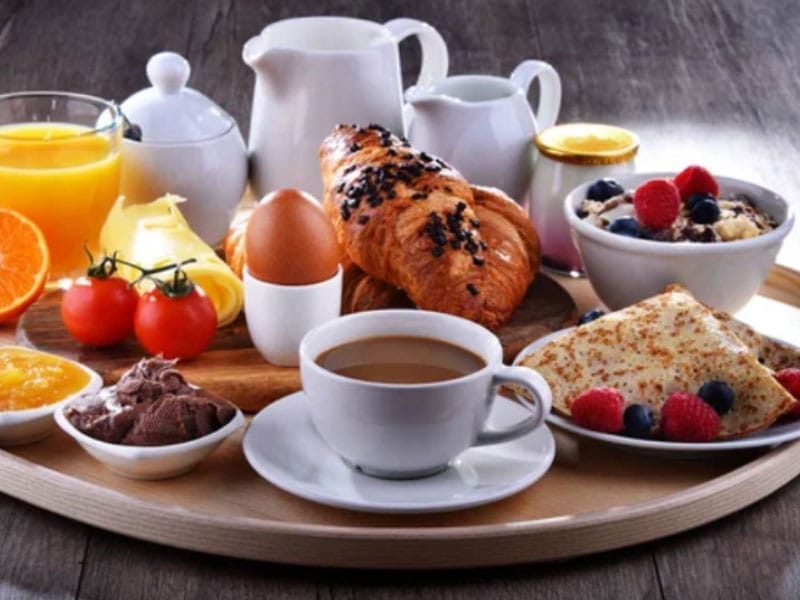 Breakfast Food Habits with platter of breakfast items
