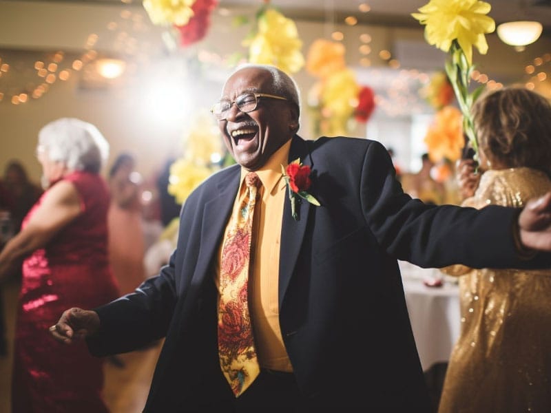 An older man dancing at a Retirement Party.